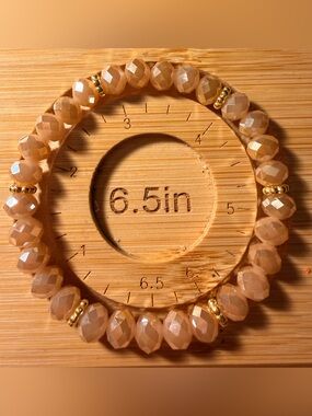 Faceted Peach Bead Stretch Bracelet with Gold Accents